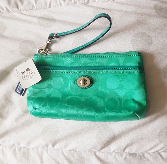Coach Handbags - NWT Coach Nylon Signature Medium Wristlet Jade